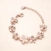 Elegant rose flower bracelet in rose gold.
