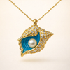 Gold necklace with radiant pearl and shell design