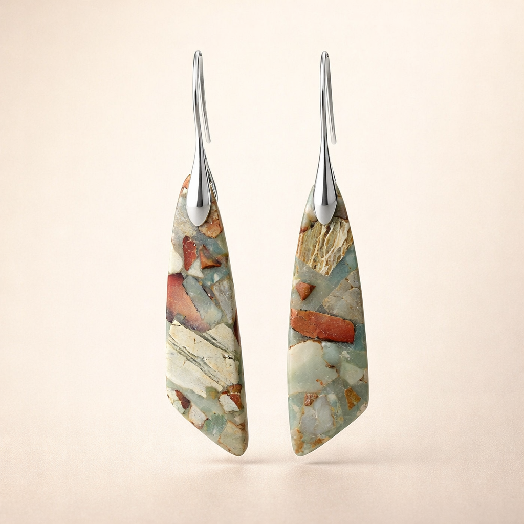 Elegant gold earrings with antique natural stone