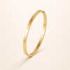 Elegant gold bangle with refined lines