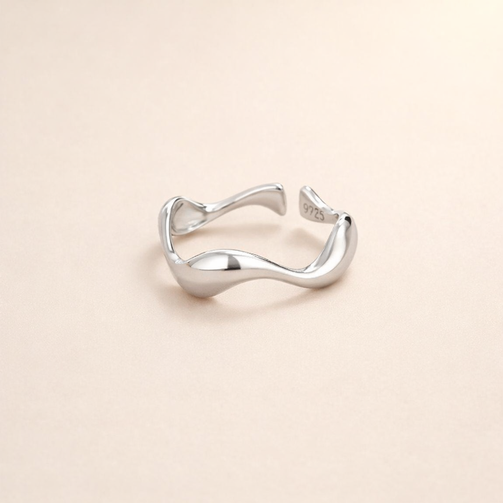 Elegant silver wave ring with refined lines
