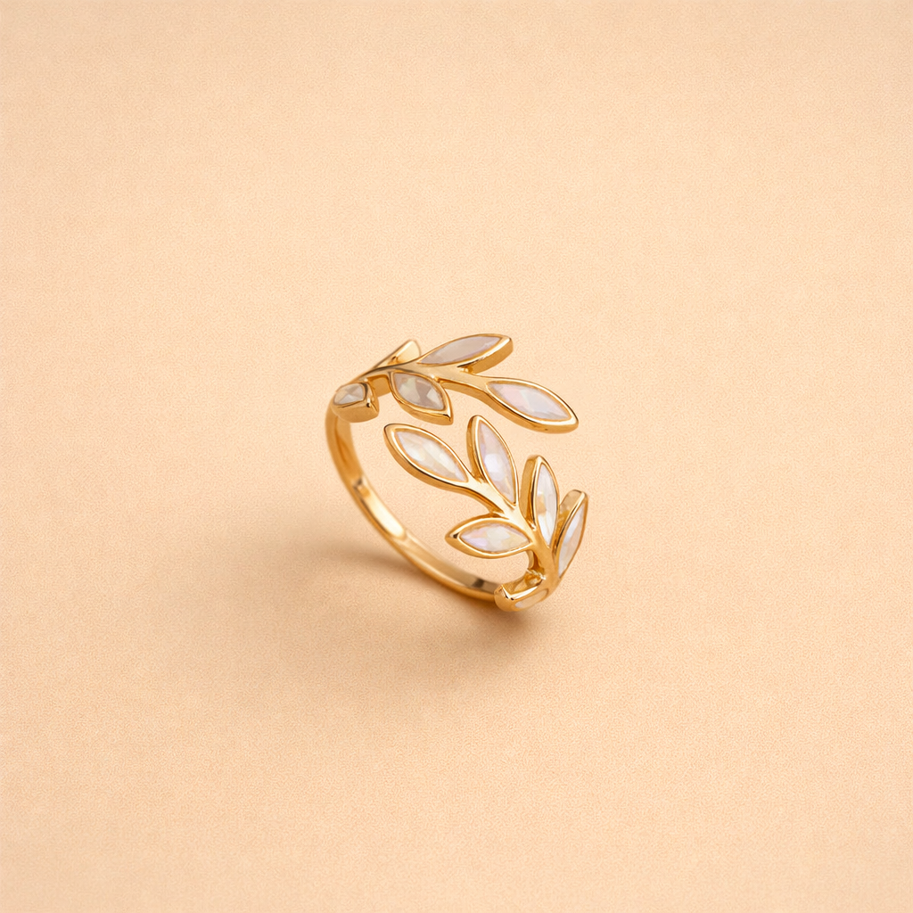 Simple silver ring with white opal leaf motif