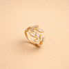 Simple silver ring with white opal leaf motif