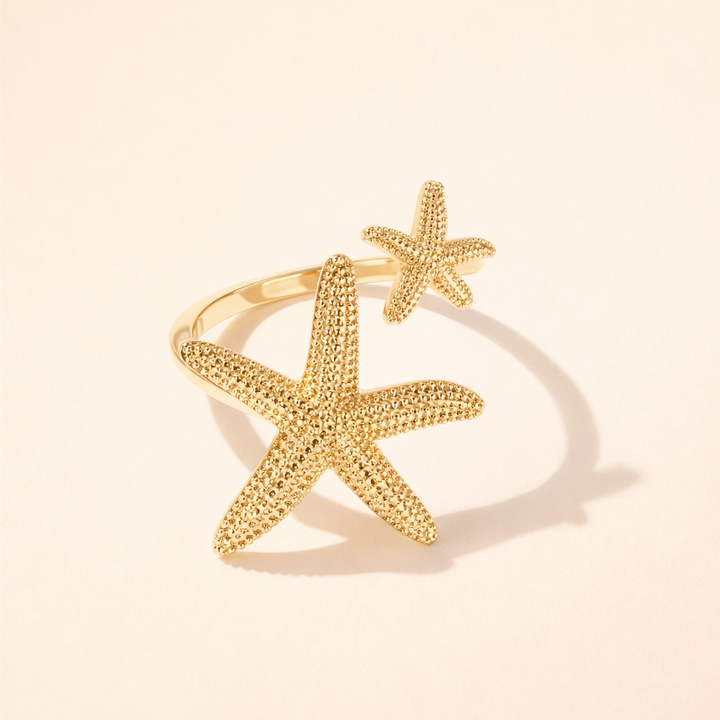Elegant starfish ring in silver with gold accents
