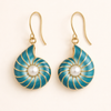 Soft mother-of-pearl earrings with shell details