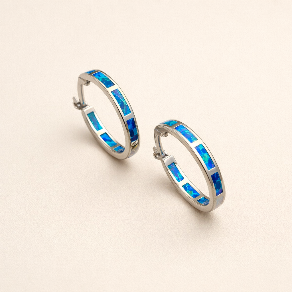 Elegant silver earrings with opal in ocean style