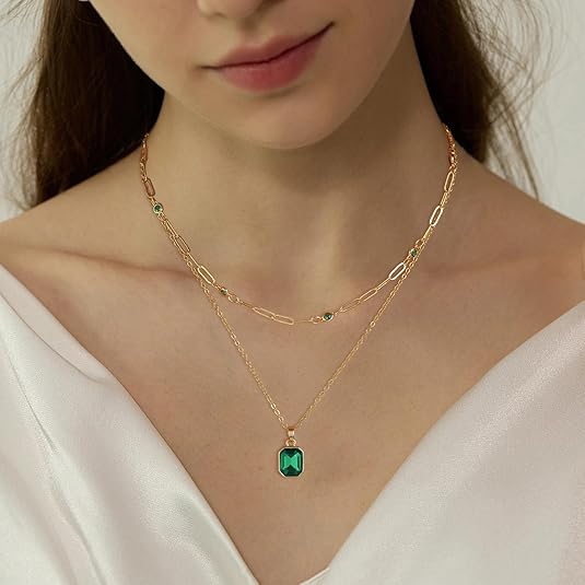 Gold necklace with four-leaf clover
