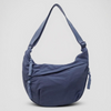 Blue nylon shoulder bag with adjustable crossbody strap