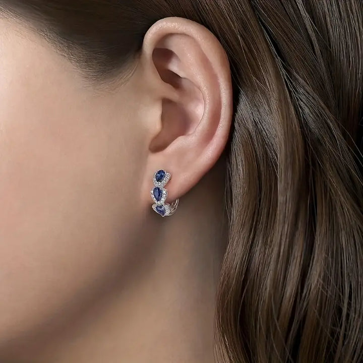 Elegant white gold earrings with sapphire accents