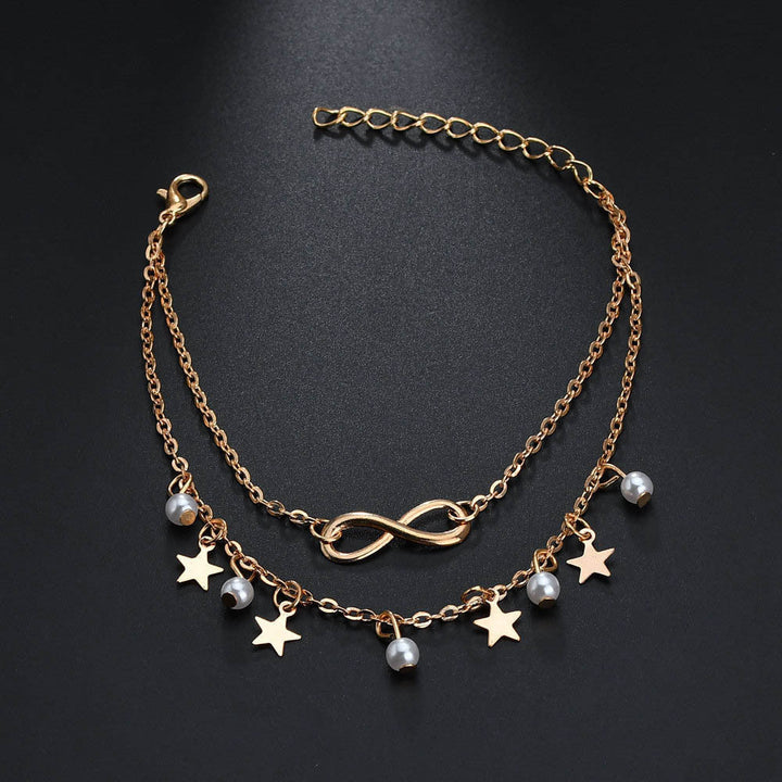 Endless pearl and stars anklet in silver