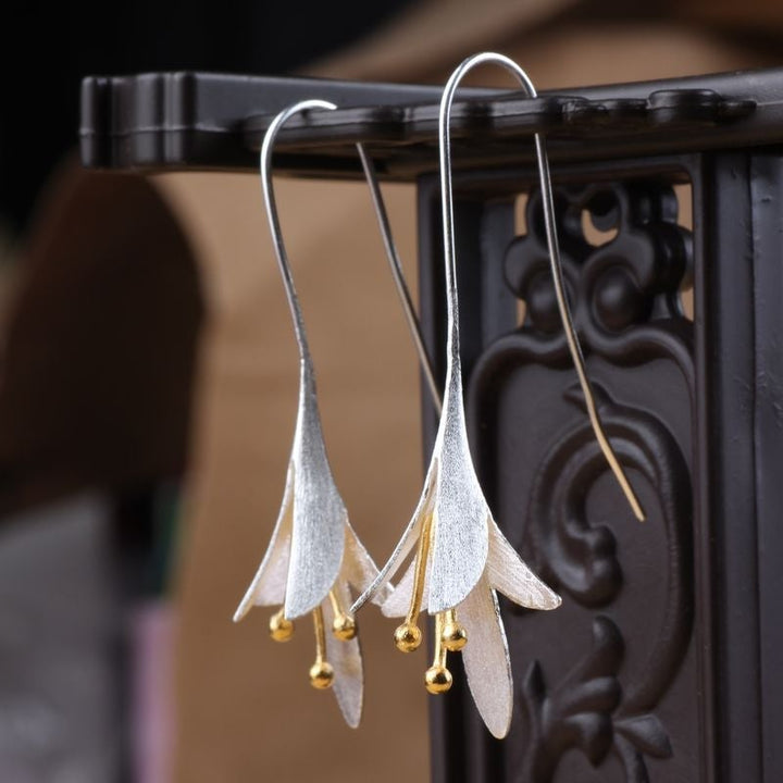 Soft Blossom Silver Earrings with Delicate Details