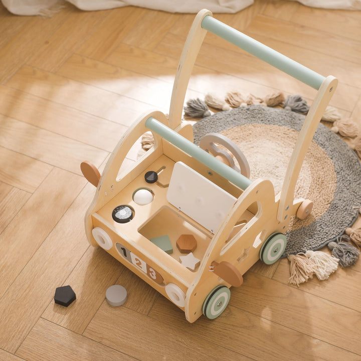 Lauflernwagen aus Holz mit Montessori-Spielelementen und Spiegeln