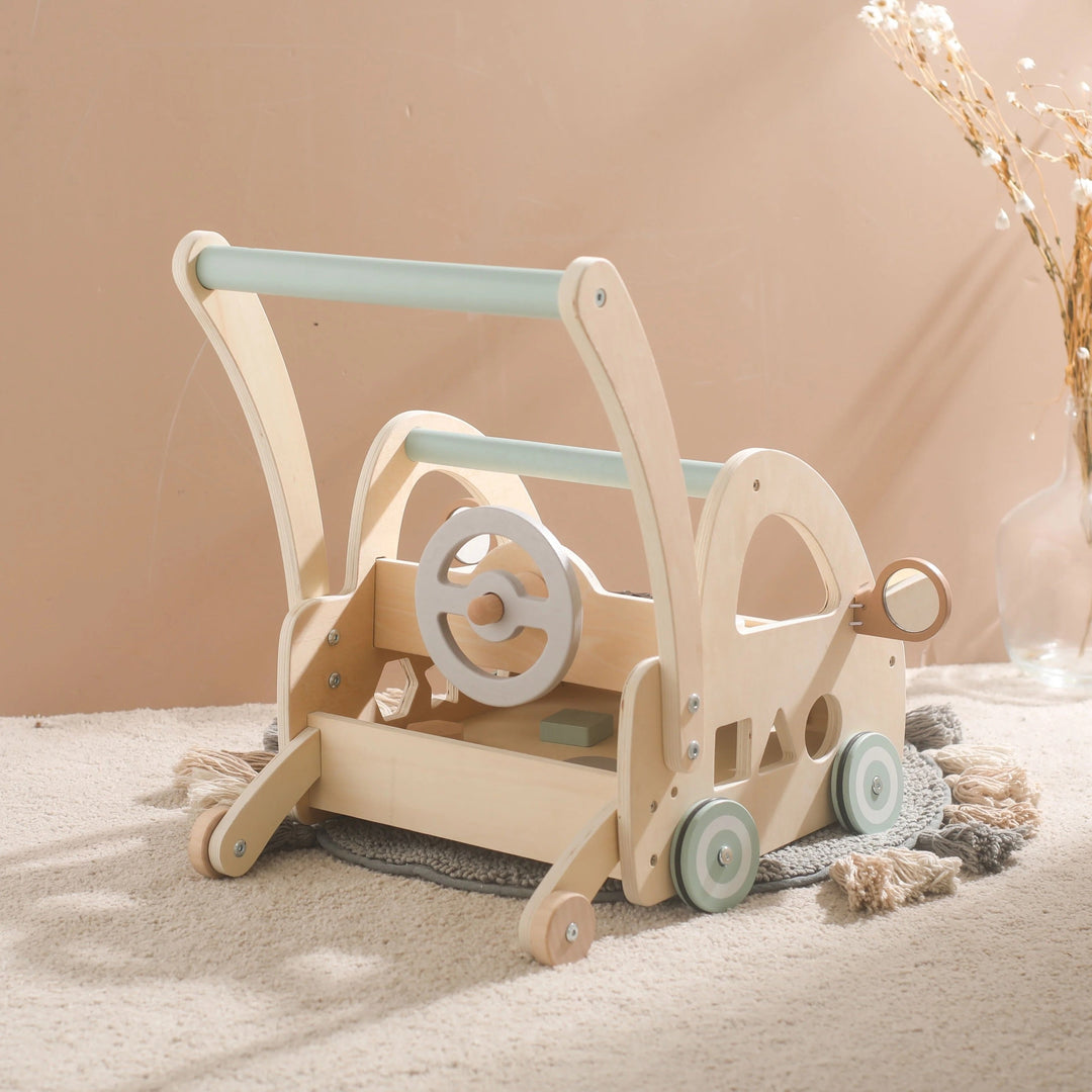 Lauflernwagen aus Holz mit Montessori-Spielelementen und Spiegeln