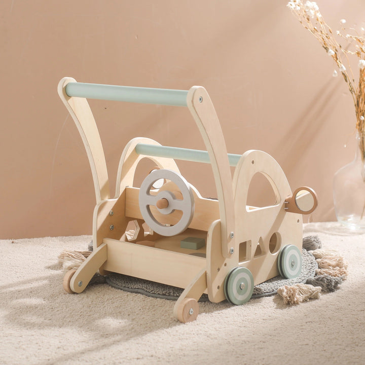 Lauflernwagen aus Holz mit Montessori-Spielelementen und Spiegeln