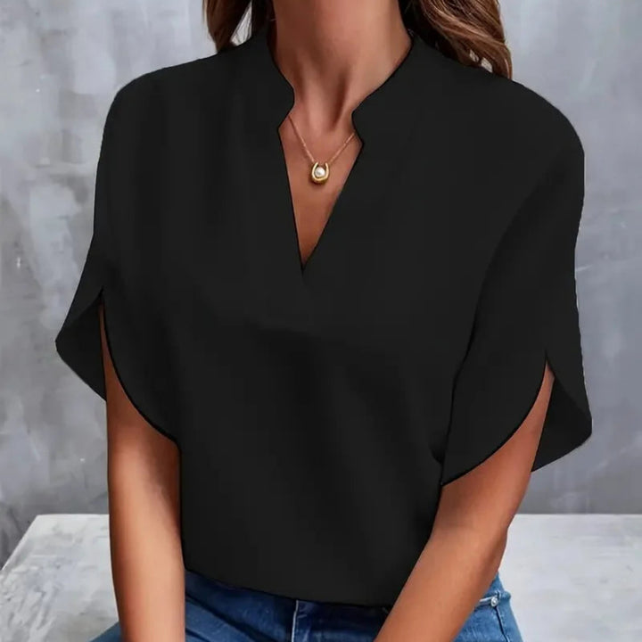 https://cdn.shopify.com/s/files/1/0864/2786/1320/files/Nora___Women_s_Blouse__Elegant__Comfortable___Versatile_White_Top_3.jpg?v=1772447184