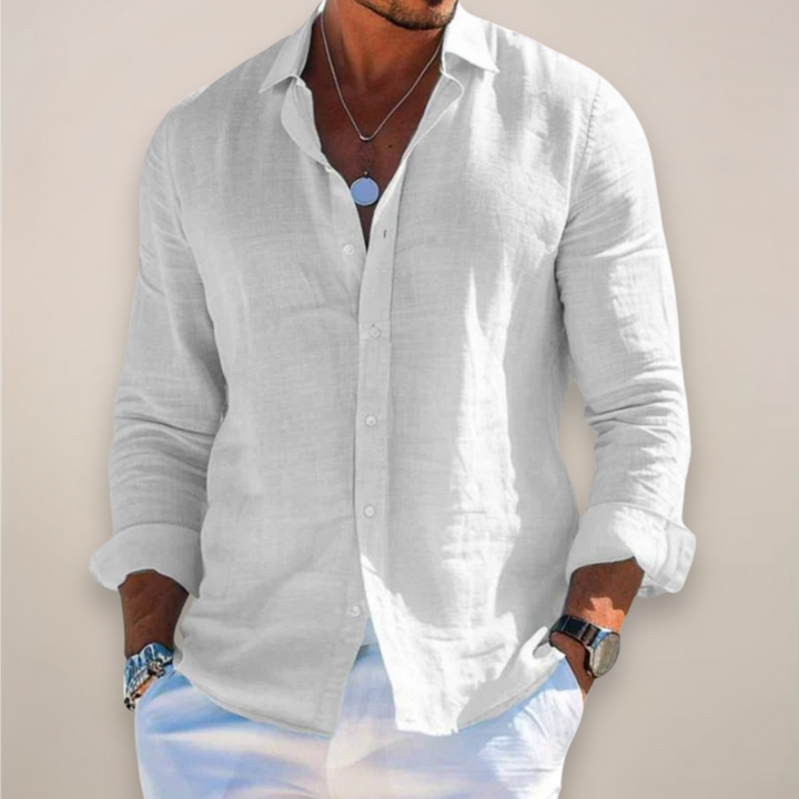 Relaxed-fit men's linen shirt with front button placket and long sleeves.