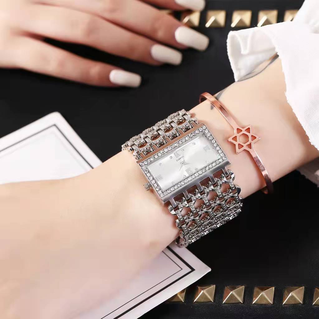Minimalist rose gold watch with subtle link chain