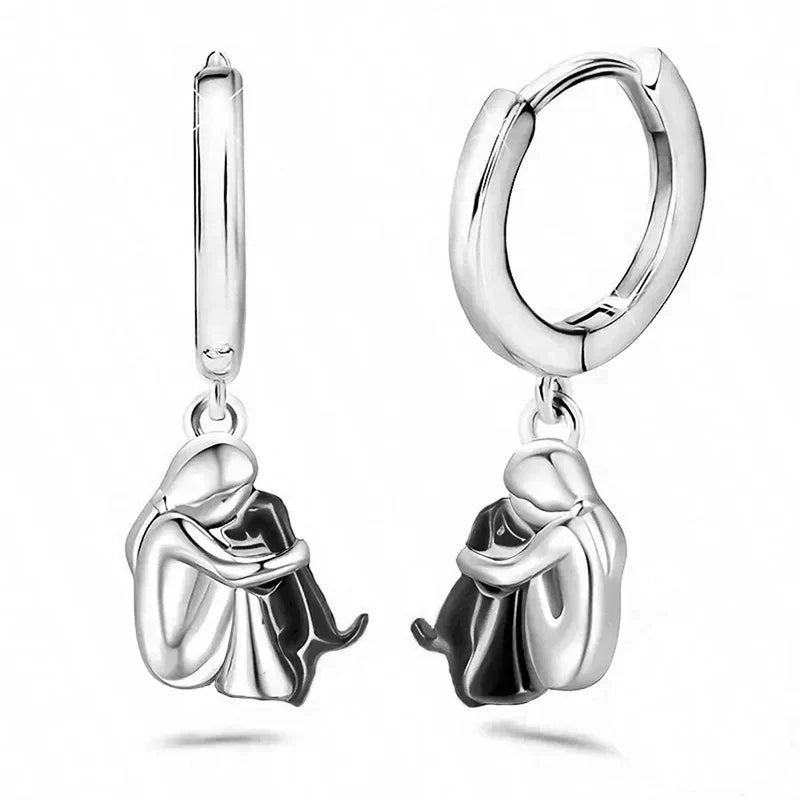 Minimalist silver earrings with little dog