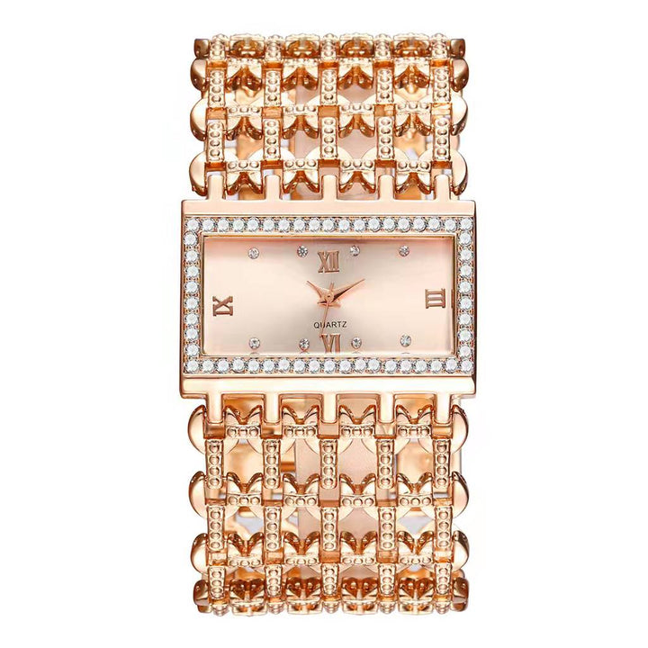 Minimalist rose gold watch with subtle link chain