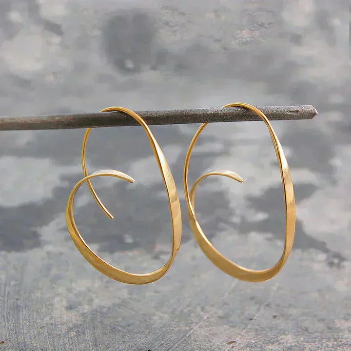 Elegant Gold Earrings with a Refined Spiral Shape