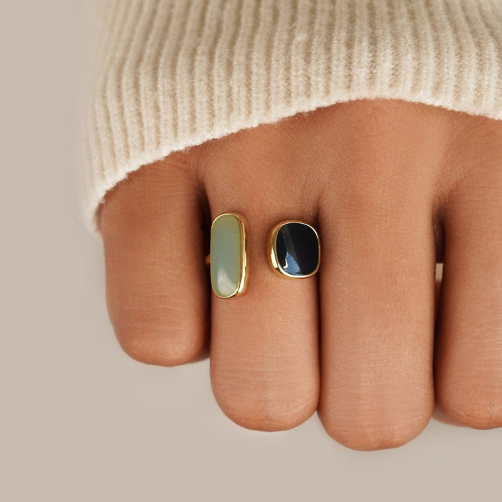 Elegant silver wrap ring with subtle shadow details