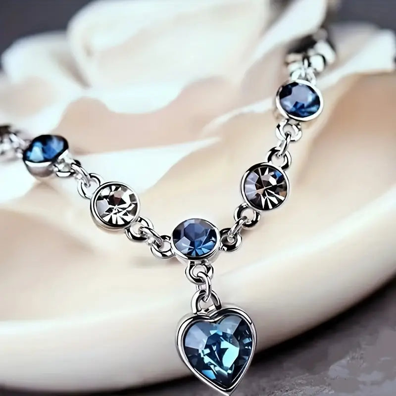 Soft shine white gold bracelet with little heart.