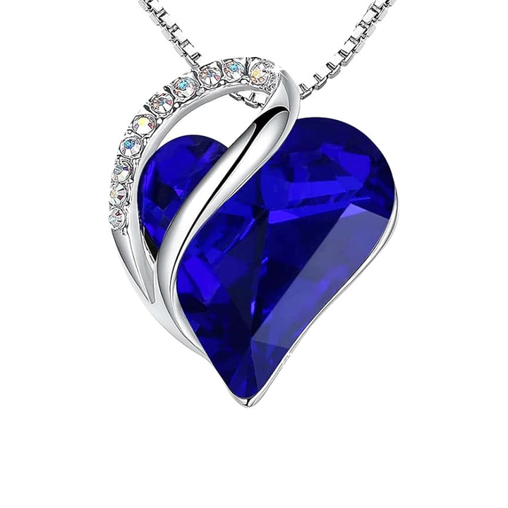 Endless heart pendant in white gold with sapphire