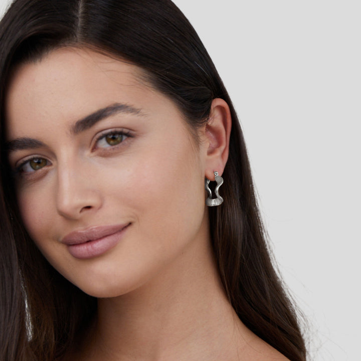 Elegant silver hoops with subtle waves