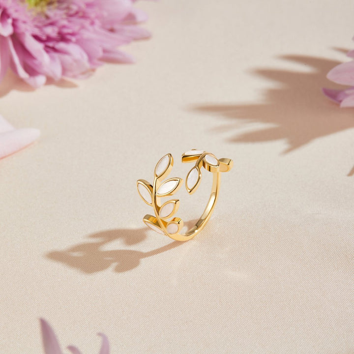 Serene gold ring with delicate little leaves