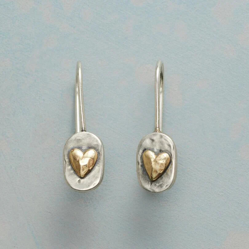 Elegant gold earrings with little heart