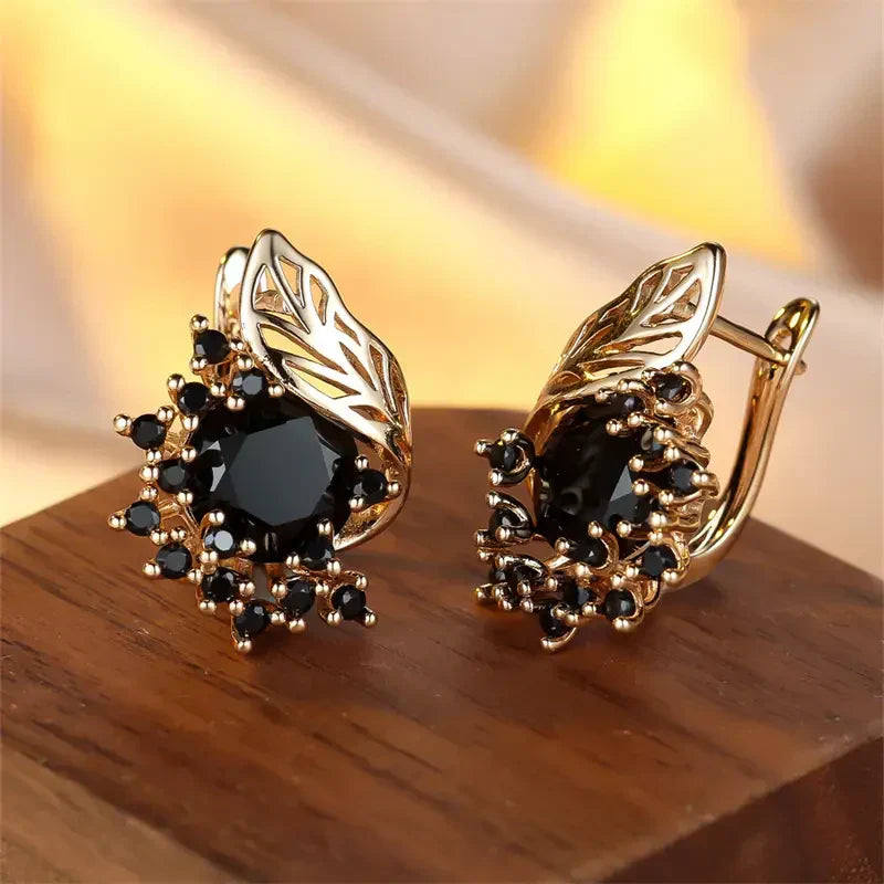 Elegant gold earrings with black cubic zirconia