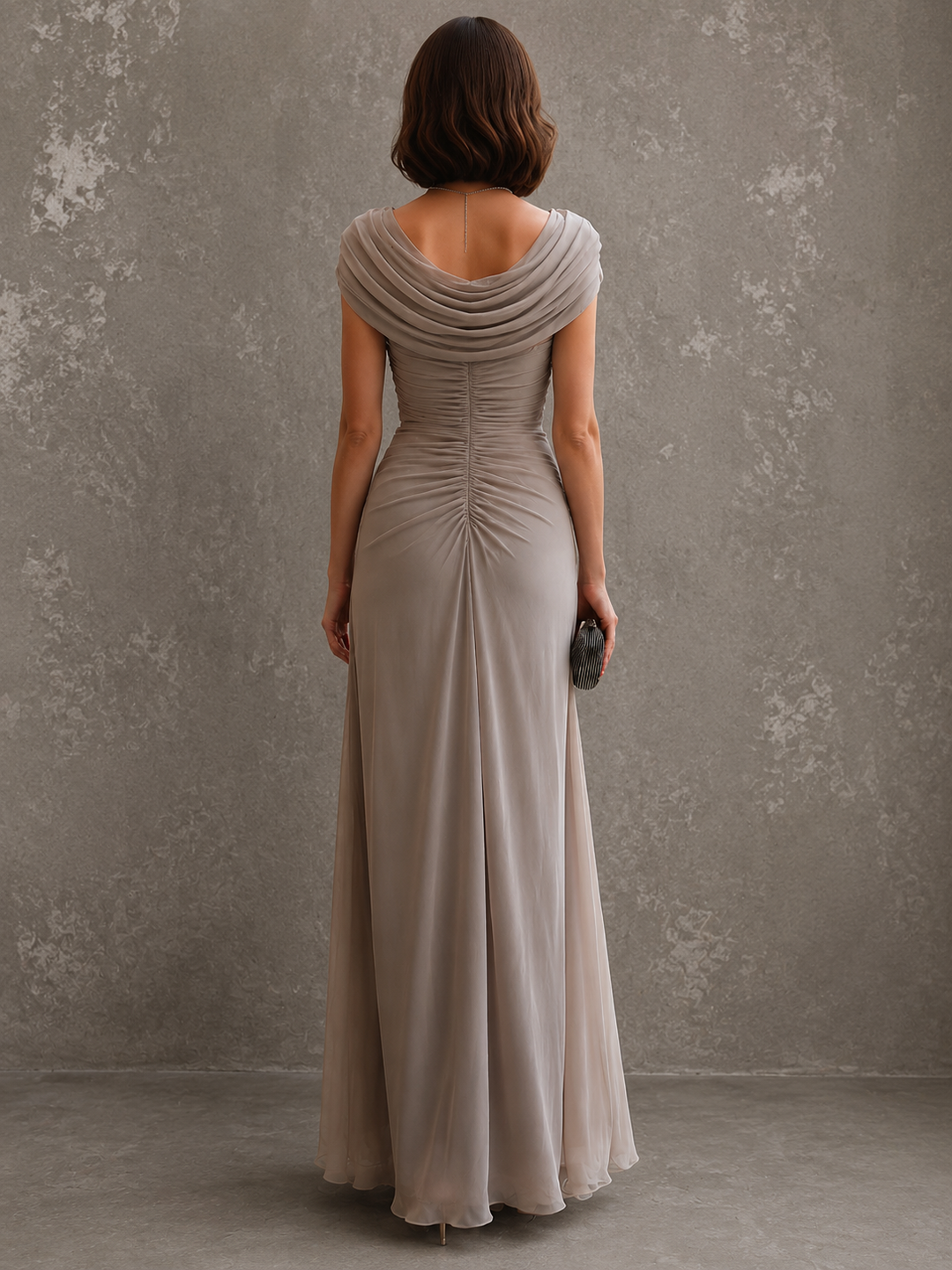 Draped sleeveless maxi dress with flowing floor-length skirt