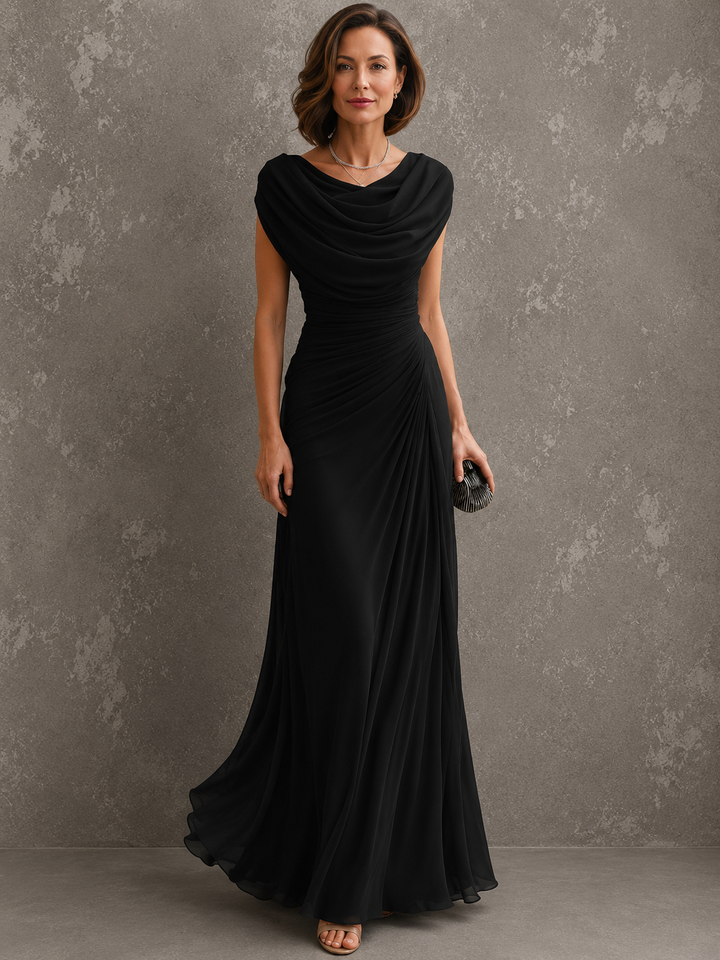 Draped sleeveless maxi dress with flowing floor-length skirt