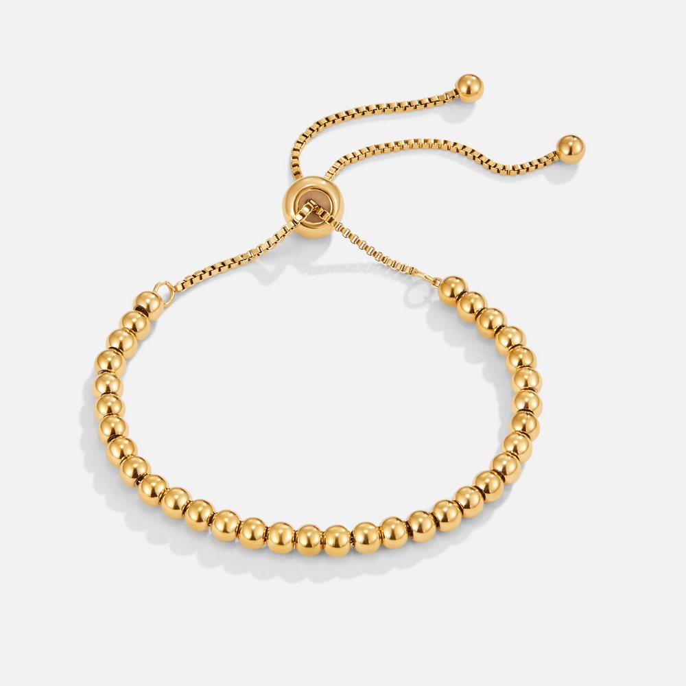 Elegant gold bracelet with pearl details