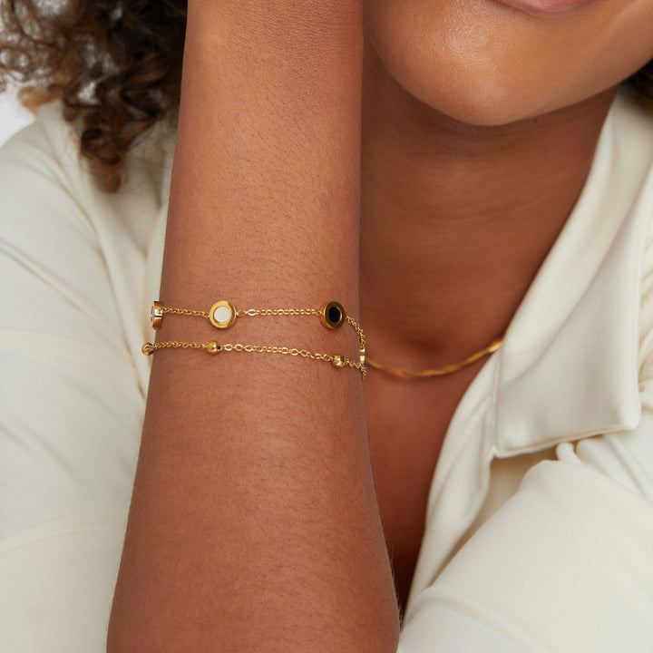 Elegant onyx and white stone bracelet