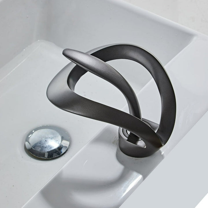 FlowArc – Modern Bathroom Tap with Waterfall Spout and Minimalist Operation